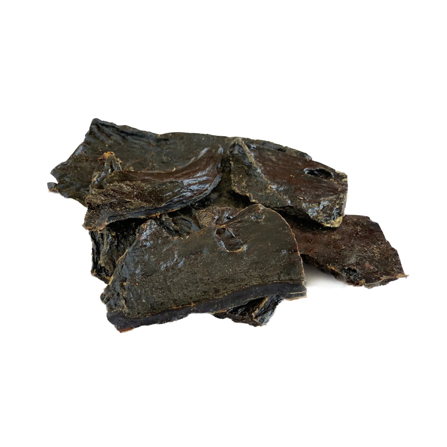 A pile of dehydrated beef liver treats on a white background.