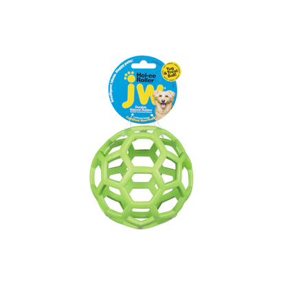 A light green dog ball toy with holes, hanging on a label tag with a dog.