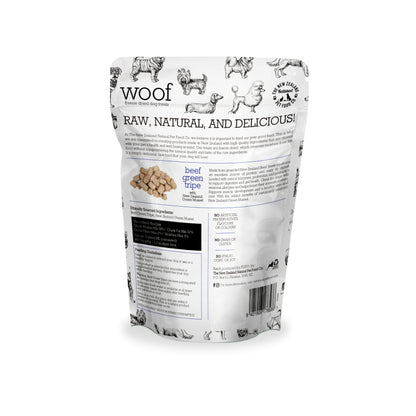 The back of a white bag with different dog breeds on it with ingredients list.